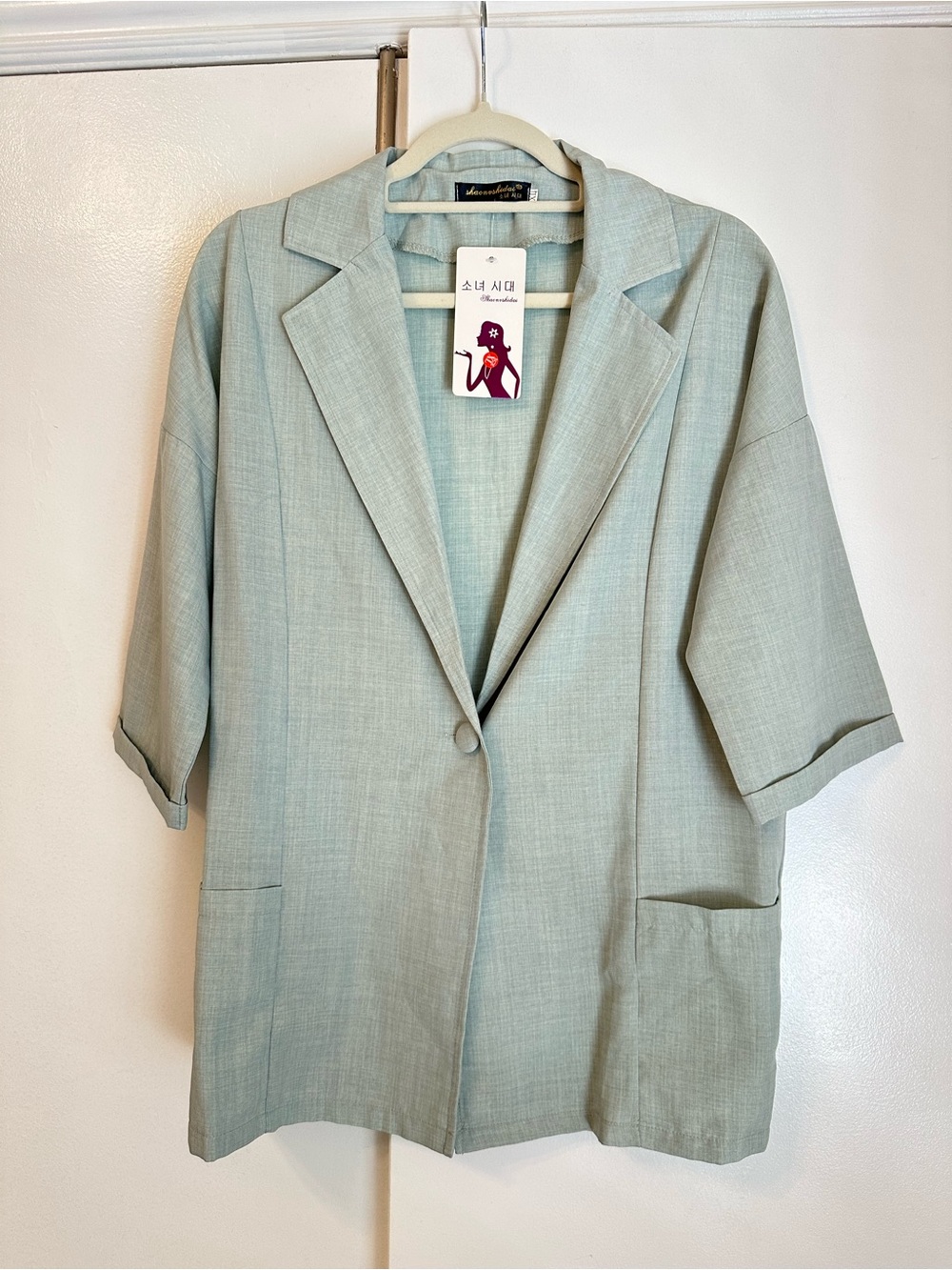 Women’s Sage Green Relaxed lightweight Blazer.